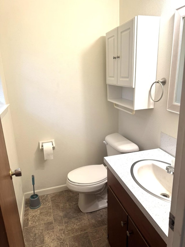 1722 Briar Ln, Wharton, TX 77488 - half bathroom with vanity and stone finish flooring