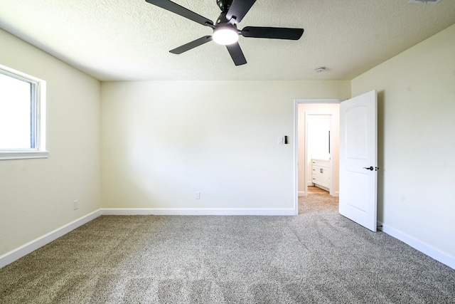 6303 Tamar Dr, Pasadena, TX 77503 - carpeted spare room featuring ceiling fan, a textured ceiling, and a smoke detector