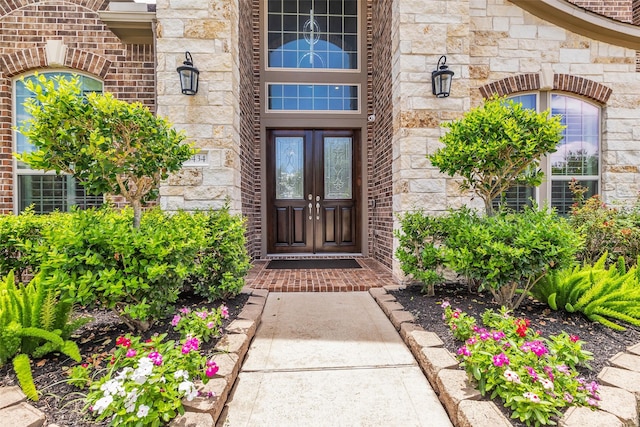 5434 Lockwood Bend Ln, Sugar Land, TX 77479 - entrance to property with stone siding and french doors