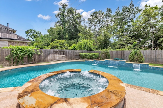 5434 Lockwood Bend Ln, Sugar Land, TX 77479 - view of pool featuring a fenced backyard and a pool with connected hot tub