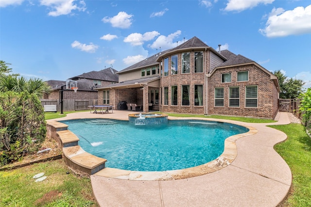5434 Lockwood Bend Ln, Sugar Land, TX 77479 - view of pool with a fenced backyard, a patio area, and a pool with connected hot tub