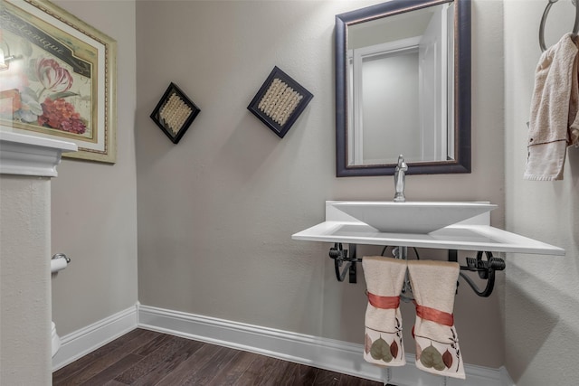 5434 Lockwood Bend Ln, Sugar Land, TX 77479 - bathroom featuring a sink and wood finished floors
