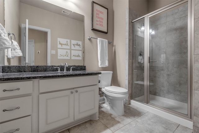 5434 Lockwood Bend Ln, Sugar Land, TX 77479 - full bathroom with vanity, a stall shower, and tile patterned flooring