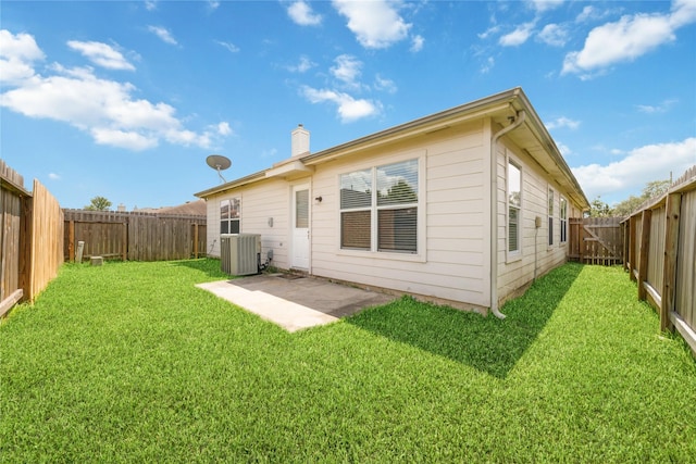 20126 Cypresswood Gln, Spring, TX 77373 - rear view of house featuring a fenced backyard, a chimney, and a patio area