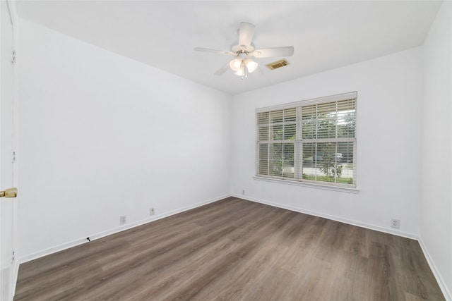 20126 Cypresswood Gln, Spring, TX 77373 - unfurnished room with wood finished floors and a ceiling fan