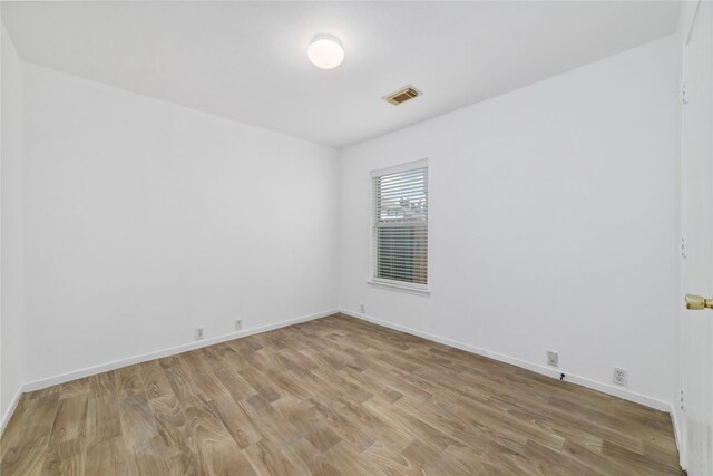 20126 Cypresswood Gln, Spring, TX 77373 - empty room featuring light wood-type flooring and baseboards