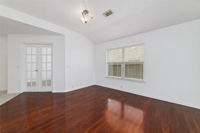20126 Cypresswood Gln, Spring, TX 77373 - unfurnished room with french doors, lofted ceiling, and wood finished floors