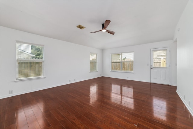 20126 Cypresswood Gln, Spring, TX 77373 - empty room featuring a ceiling fan, plenty of natural light, and wood finished floors