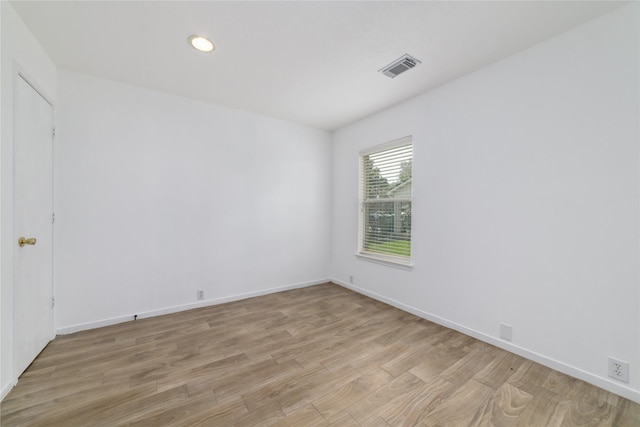 20126 Cypresswood Gln, Spring, TX 77373 - empty room featuring light wood-type flooring and recessed lighting