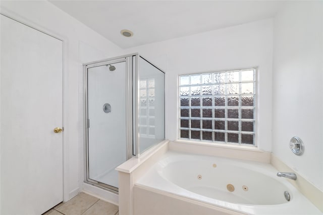 20126 Cypresswood Gln, Spring, TX 77373 - bathroom with a stall shower, a tub with jets, and tile patterned floors