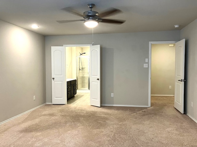15806 Perthshire Creek Dr, Humble, TX 77346 - unfurnished bedroom featuring light carpet, connected bathroom, and ceiling fan