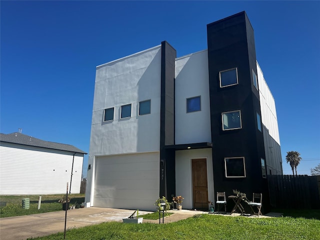 9737 Fabiola Dr, Houston, TX 77075 - rear view of house featuring driveway and a garage