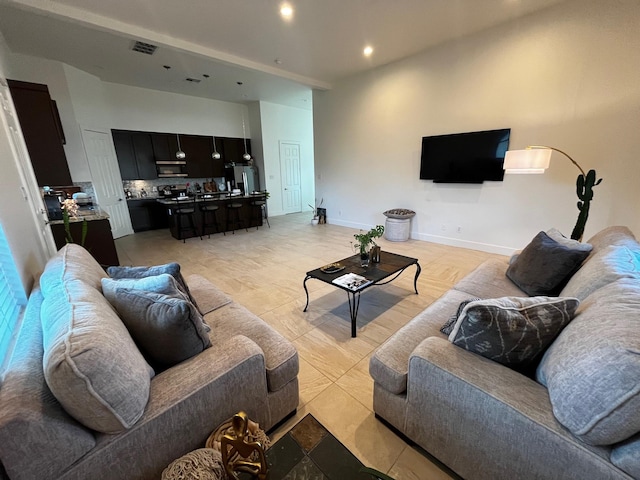 9737 Fabiola Dr, Houston, TX 77075 - living room with recessed lighting and light tile patterned flooring