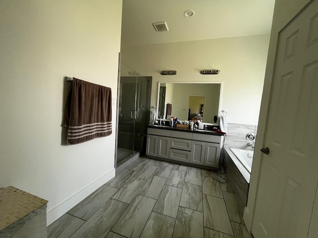 9737 Fabiola Dr, Houston, TX 77075 - full bathroom with a shower stall, a bath, double vanity, and marble finish flooring