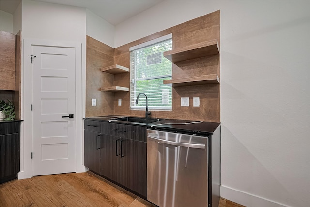 2015 Creston Dr, Houston, TX 77026 - kitchen featuring dishwasher, open shelves, tasteful backsplash, light wood-type flooring, and dark countertops