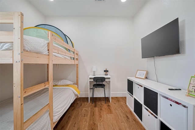 2015 Creston Dr, Houston, TX 77026 - bedroom with light wood-style floors and recessed lighting