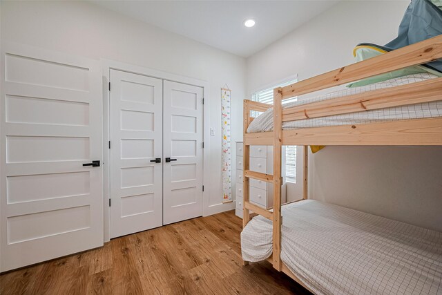 2015 Creston Dr, Houston, TX 77026 - bedroom featuring wood finished floors, a closet, and recessed lighting