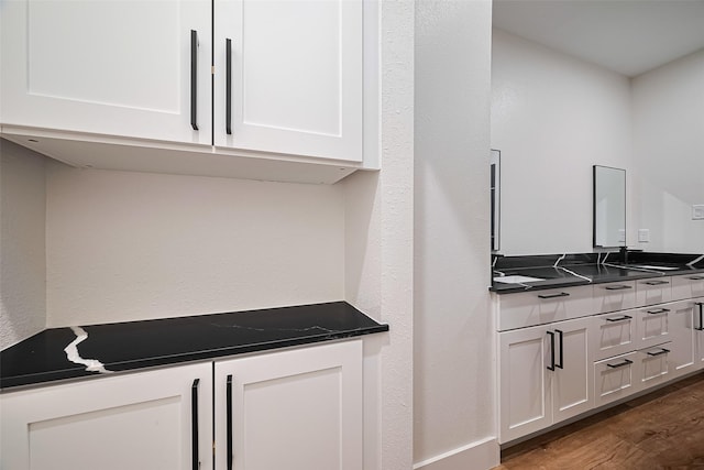2015 Creston Dr, Houston, TX 77026 - bar area featuring wood finished floors and a sink