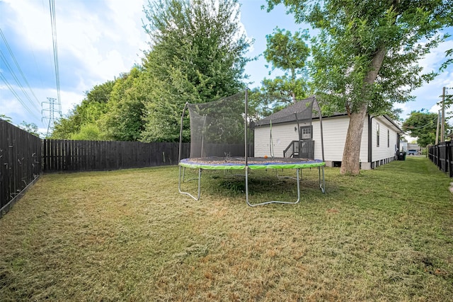 2015 Creston Dr, Houston, TX 77026 - fenced backyard with a trampoline