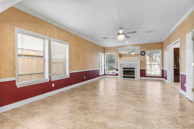 5602 Society Ln, Houston, TX 77084 - unfurnished living room with ceiling fan, ornamental molding, and a tile fireplace