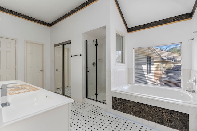 5602 Society Ln, Houston, TX 77084 - full bath with a shower stall, a garden tub, ornamental molding, double vanity, and a closet