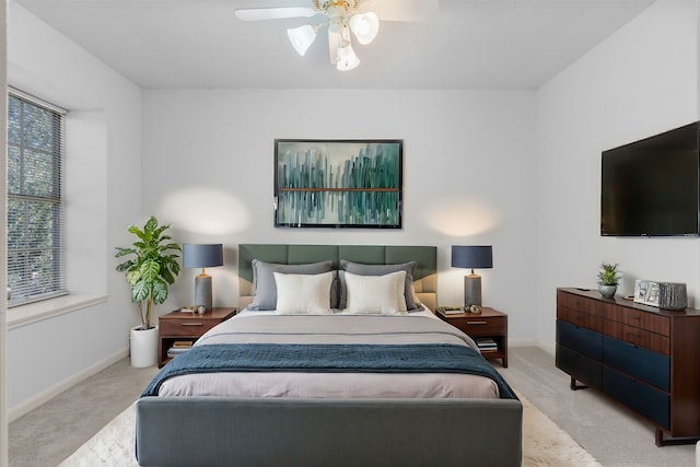 5602 Society Ln, Houston, TX 77084 - carpeted bedroom with baseboards and a ceiling fan