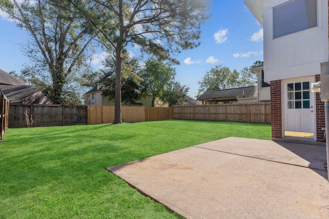 5602 Society Ln, Houston, TX 77084 - fenced backyard featuring a patio
