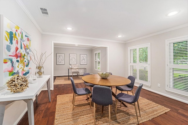 2535 Rosefield Dr, Houston, TX 77080 - dining space featuring dark wood-style floors, ornamental molding, and recessed lighting