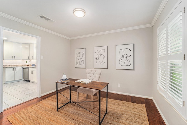 2535 Rosefield Dr, Houston, TX 77080 - office area with light wood-style flooring and crown molding