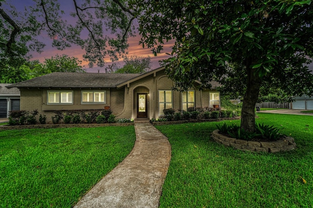 2535 Rosefield Dr, Houston, TX 77080 - view of front of house with brick siding, a lawn, and a shingled roof