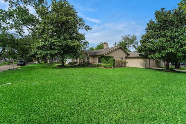 2535 Rosefield Dr, Houston, TX 77080 - view of front of home featuring a front yard and a chimney