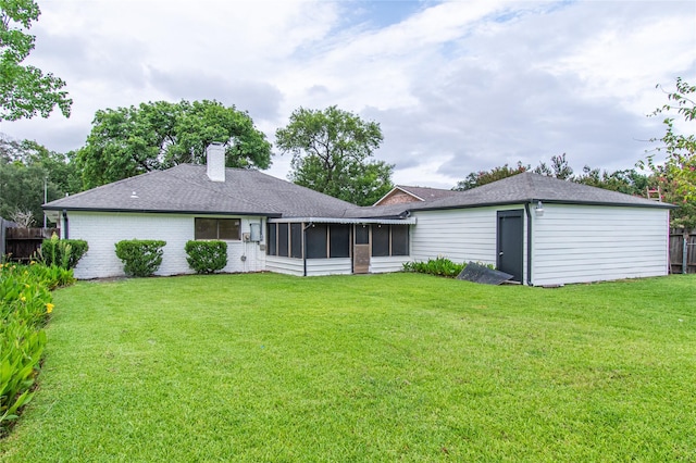 11523 Bandlon Dr, Houston, TX 77072 - rear view of house with a sunroom, a chimney, and a shingled roof
