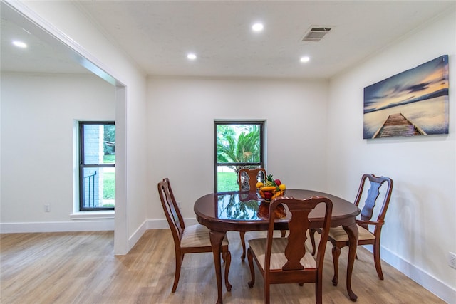 11523 Bandlon Dr, Houston, TX 77072 - dining room featuring light wood finished floors and recessed lighting