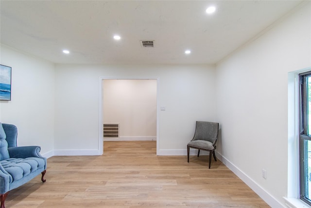 11523 Bandlon Dr, Houston, TX 77072 - living area featuring recessed lighting, light wood finished floors, and ornamental molding