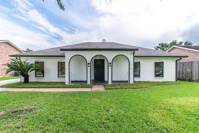 11523 Bandlon Dr, Houston, TX 77072 - view of front facade with brick siding, a shingled roof, and a porch