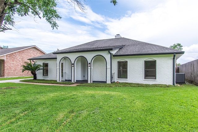 11523 Bandlon Dr, Houston, TX 77072 - view of front of house featuring brick siding, a shingled roof, and a chimney