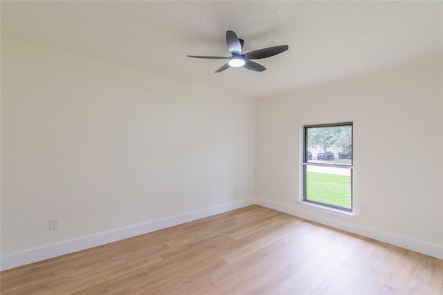 11523 Bandlon Dr, Houston, TX 77072 - empty room with light wood finished floors and a ceiling fan