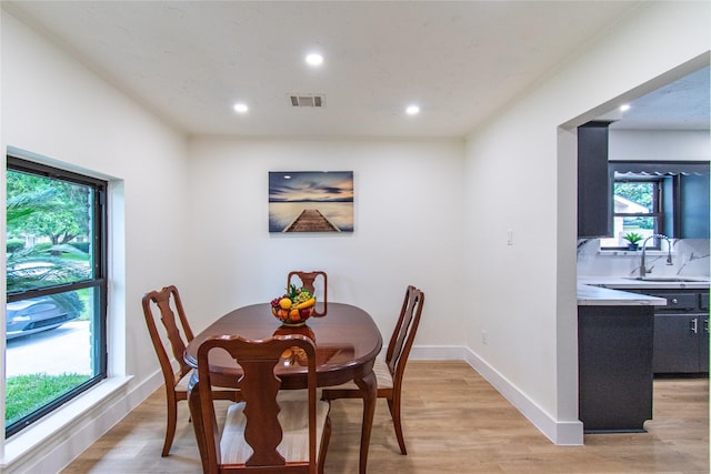 11523 Bandlon Dr, Houston, TX 77072 - dining room with light wood-style flooring and recessed lighting