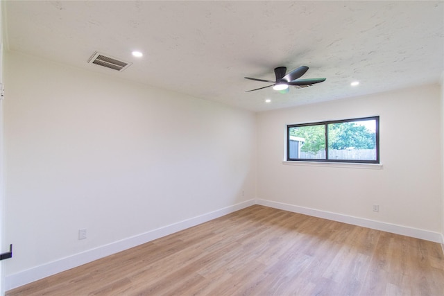 11523 Bandlon Dr, Houston, TX 77072 - spare room with light wood-type flooring, ceiling fan, and recessed lighting