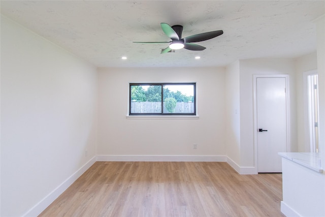 11523 Bandlon Dr, Houston, TX 77072 - unfurnished room featuring light wood finished floors, ceiling fan, and recessed lighting