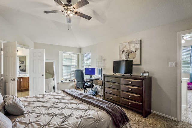 18605 Syndee Loch Ct, Spring, TX 77379 - carpeted bedroom featuring lofted ceiling, ensuite bathroom, an office area, and a ceiling fan