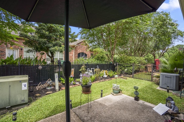 18605 Syndee Loch Ct, Spring, TX 77379 - fenced yard with a patio area