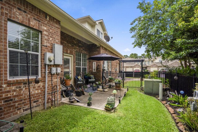 18605 Syndee Loch Ct, Spring, TX 77379 - view of yard featuring a patio area