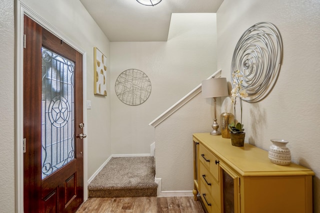 18605 Syndee Loch Ct, Spring, TX 77379 - entryway with wood finished floors and stairway