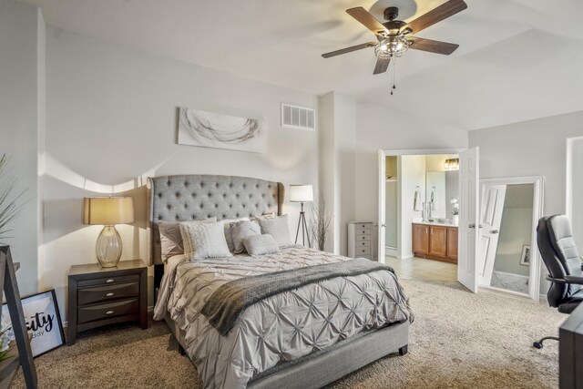 18605 Syndee Loch Ct, Spring, TX 77379 - bedroom with vaulted ceiling, carpet, connected bathroom, and a ceiling fan