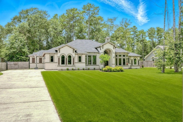 17114 Leon Ct, Splendora, TX 77372 - back of property with stucco siding and a shingled roof