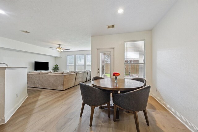 4206 Brazos Bend Dr, Pearland, TX 77584 - dining room with light wood finished floors, ceiling fan, and recessed lighting