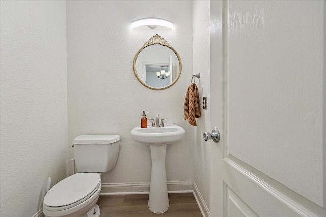 4206 Brazos Bend Dr, Pearland, TX 77584 - half bathroom featuring toilet and baseboards