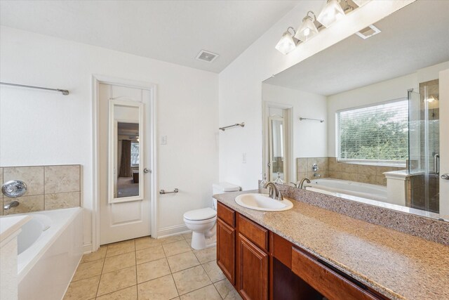 4206 Brazos Bend Dr, Pearland, TX 77584 - bathroom with a bath, tile patterned floors, vanity, and a shower stall