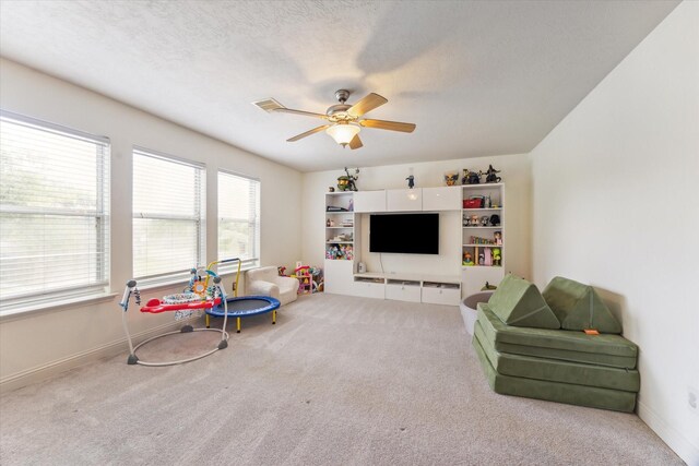 4206 Brazos Bend Dr, Pearland, TX 77584 - playroom featuring carpet and a ceiling fan